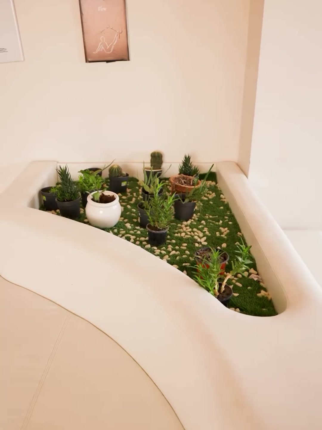 Zen corner with plants and Flow artwork at CoreFlow
